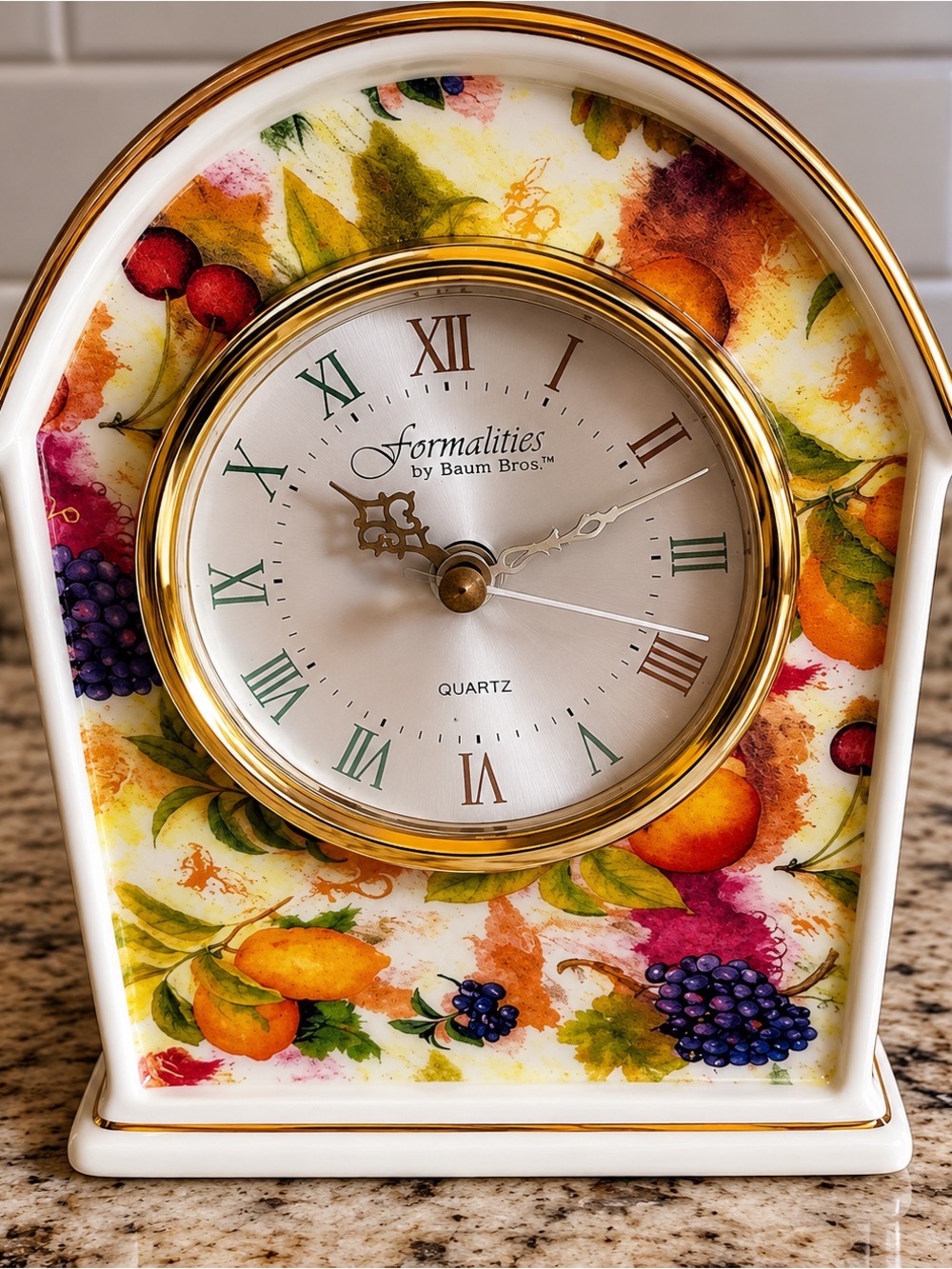 Formalities by Baum Bros. Decorative Quartz Mantel Clock – Fruit & Vineyard Desi